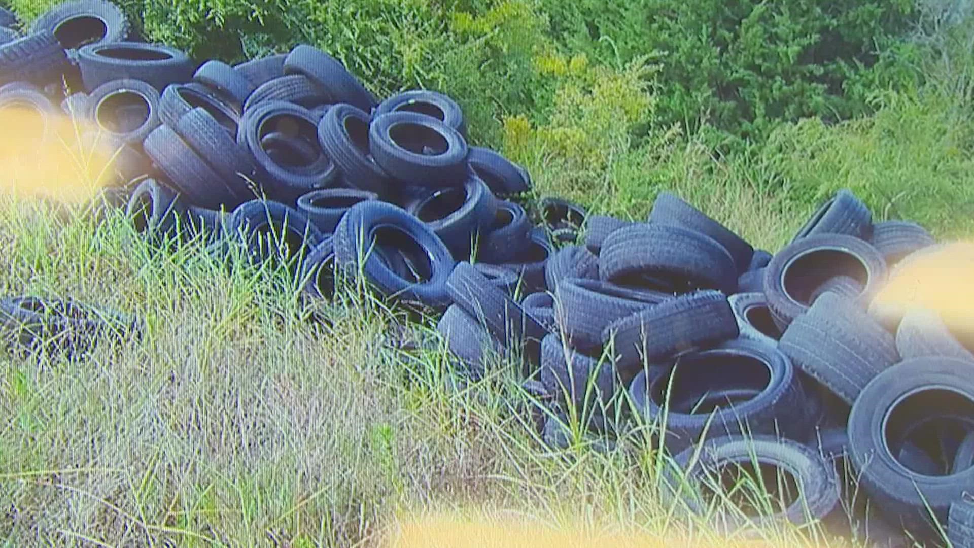 The Dallas Marshal's Office says surveillance cameras helped identify a man who was dumping tires at sites across Dallas and Ellis County. The probe is ongoing.