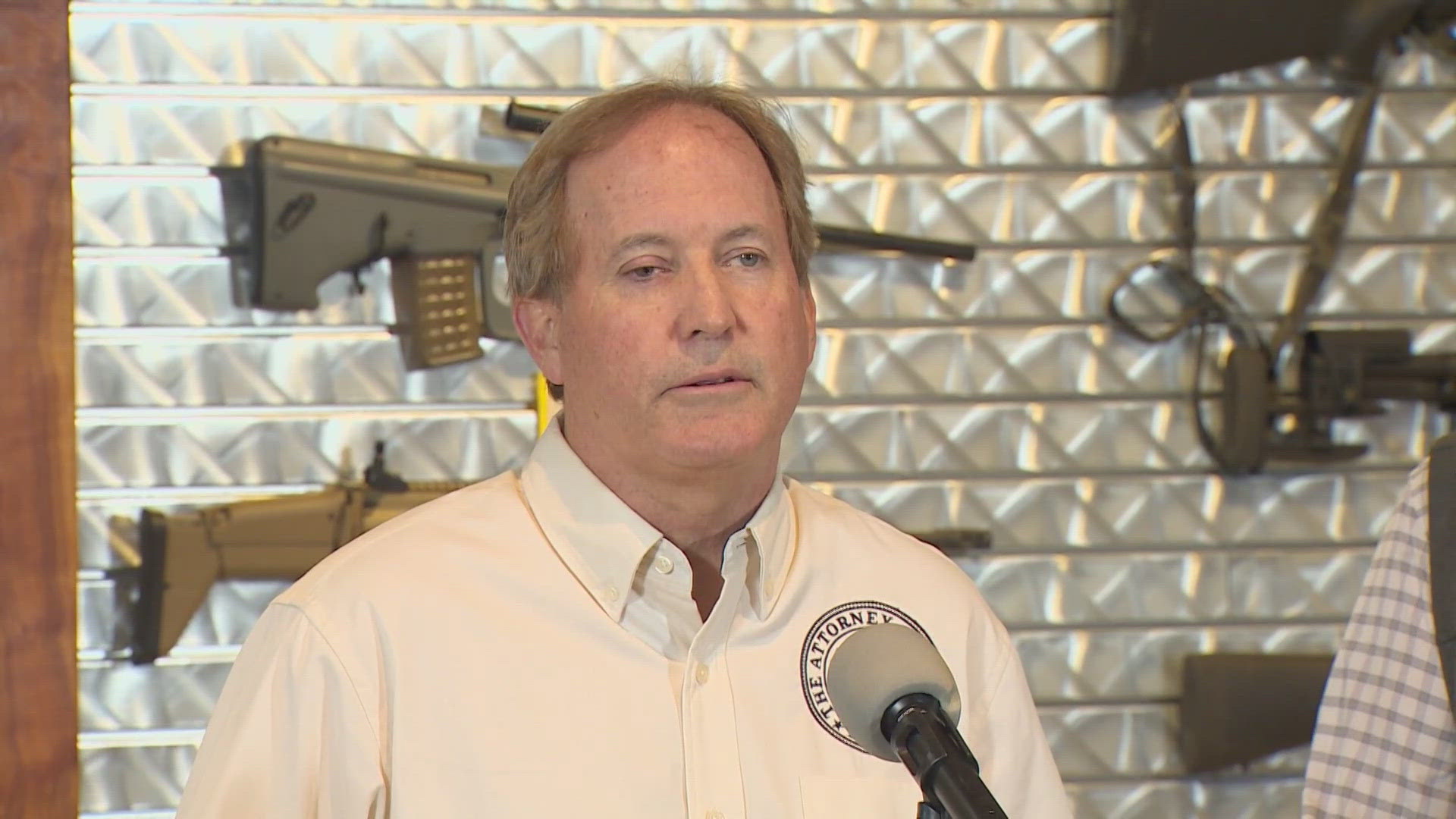 The new rules require background checks for all gun sales transactions. Paxton says it goes too far.