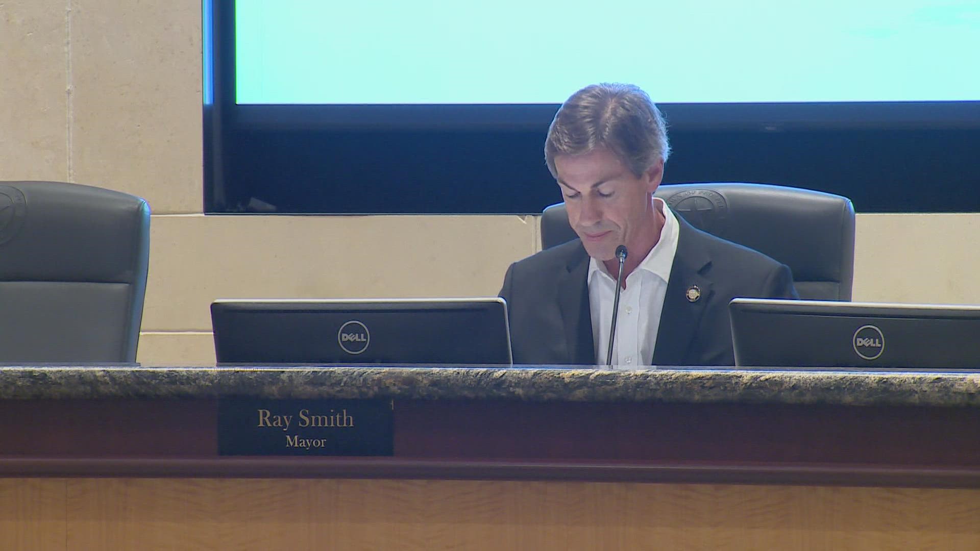 Mayor Ray Smith told WFAA he was unaware a motorcyclist rear-ended him, thinking another vehicle had. He says he left the accident to chase after that car instead.