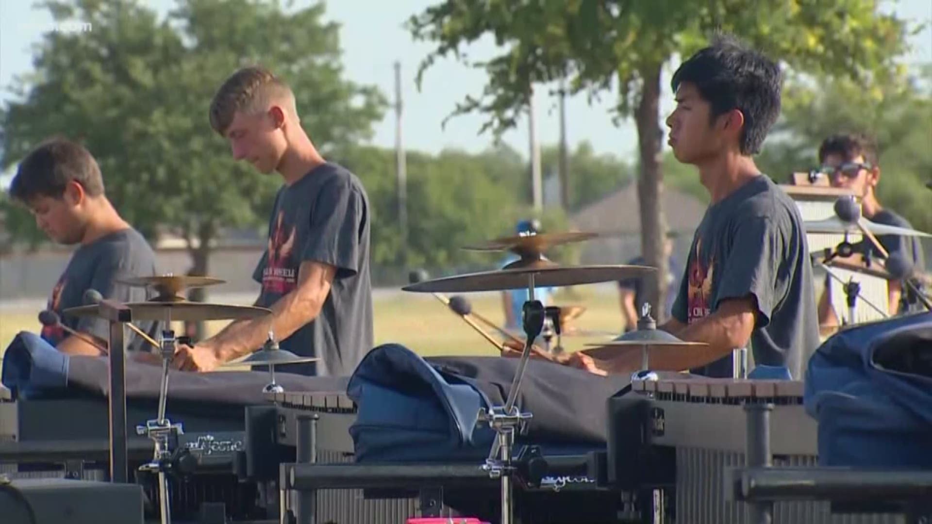Drum corps performance under sweltering sun