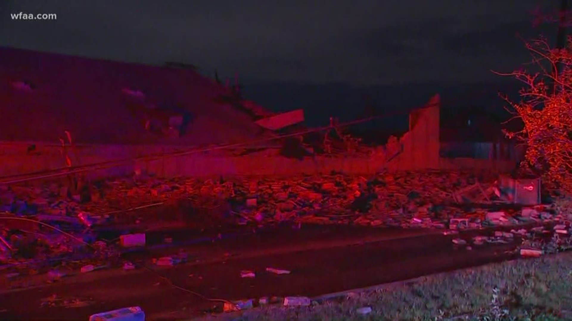 At Walnut Hill east of Denton Drive, a tornado tore through a building.
