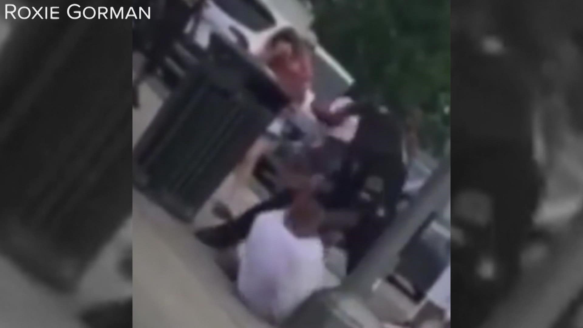 A Dallas police office seen punching a man in Deep Ellum in a viral video has been fired from the department according to police.