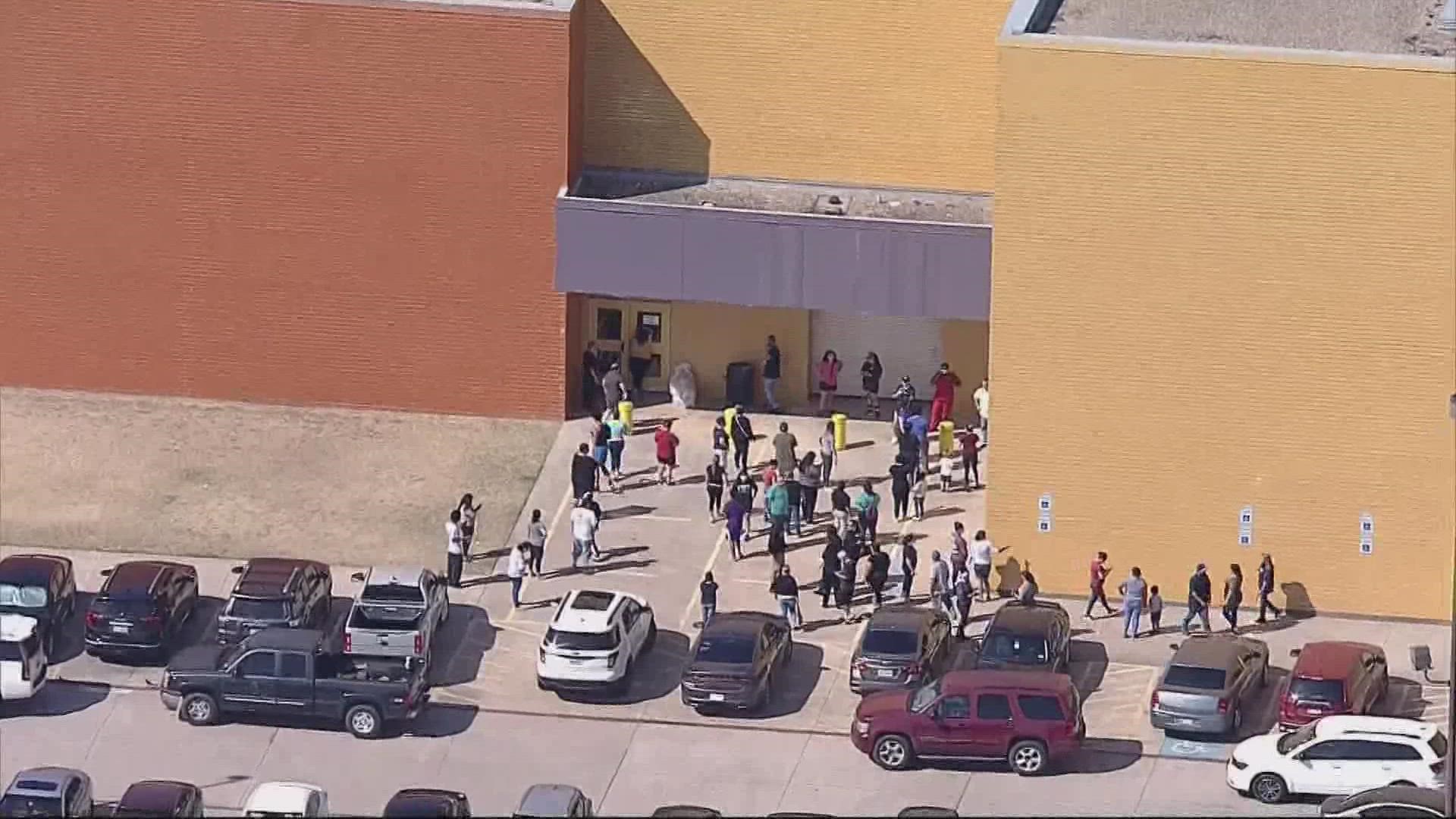 Administrators told WFAA that there was “no active threat” following a report of guns found at the school.