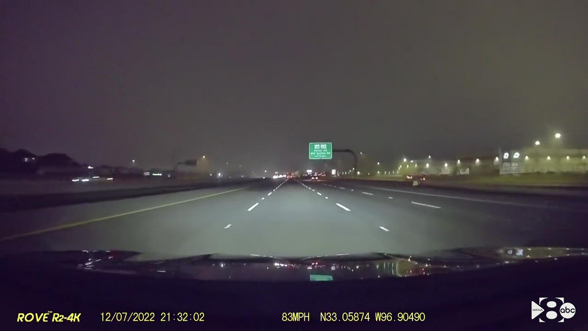 The video captures the moment one of two vehicles suspected of racing crashed into a third vehicle.