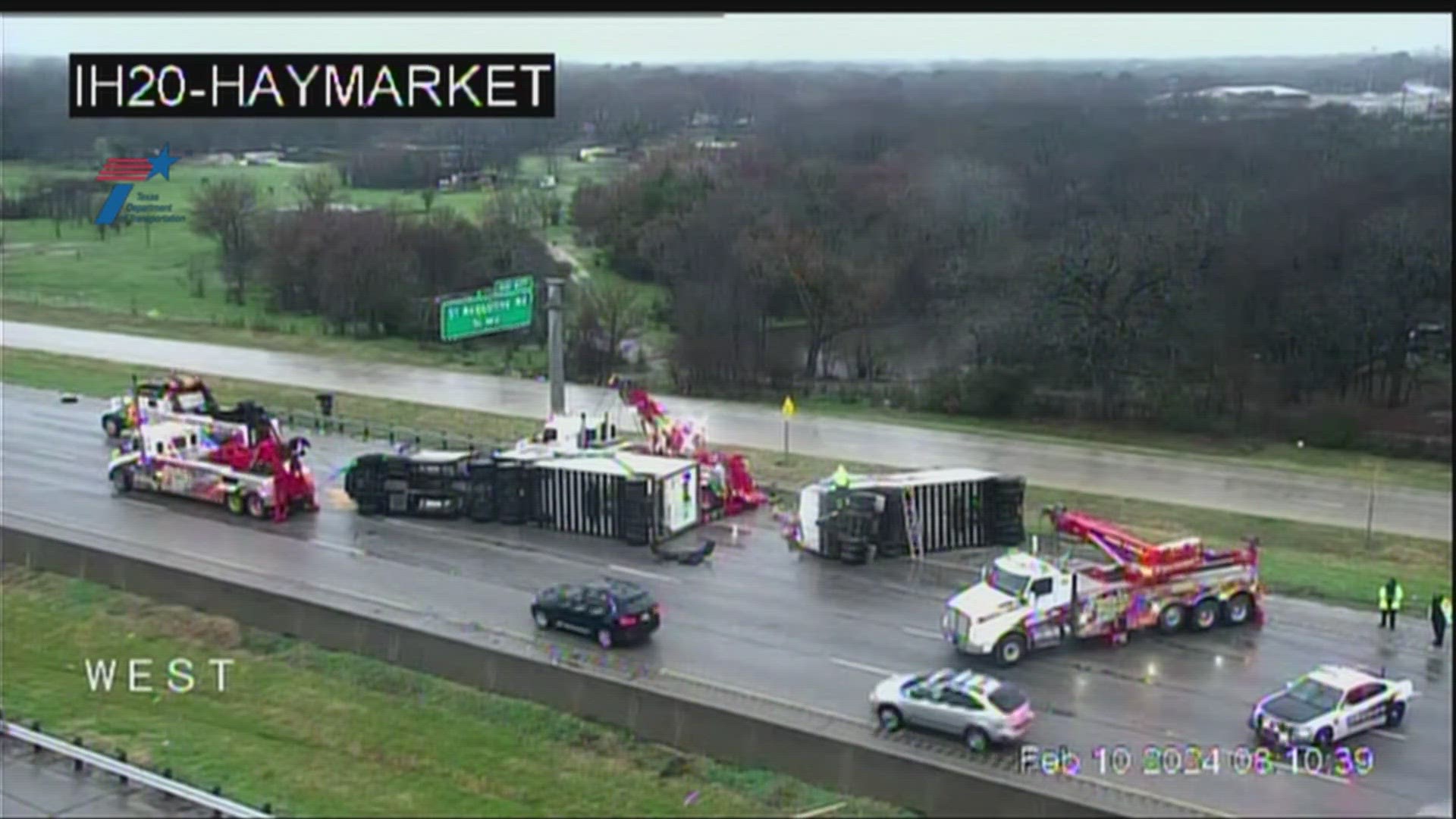 I-20 at Haymarket Road was reduced to one lane Saturday morning as crews cleaned up after the rollover.