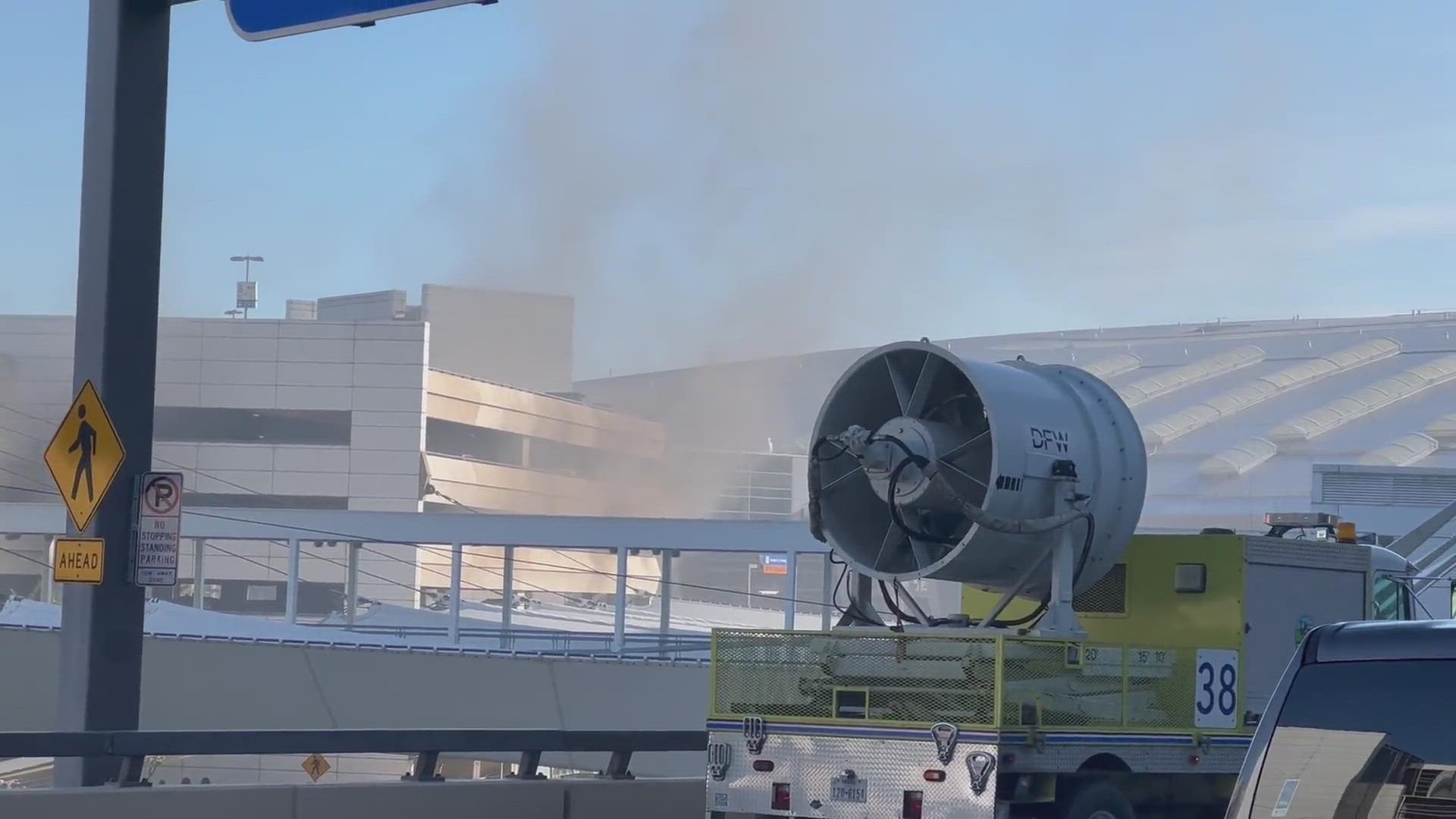 Viewer video captured fire crews responding to a fire at DFW Airport's D Terminal parking garage on Monday, Oct. 18, 2021.
Credit: J R Richardson