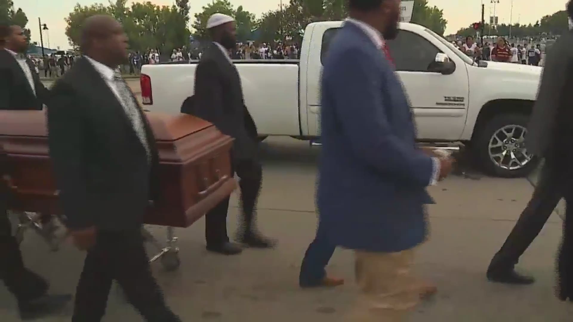They carried a casket as a symbolic funeral procession in honor of Jean before the Cowboys-Giants game SUnday.