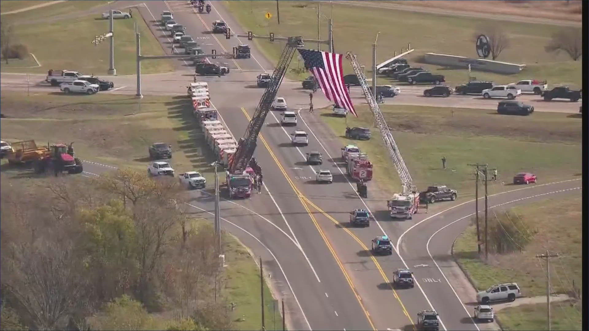 Aerial footage showed the North Texas community come out to pay their respects to the late officer.