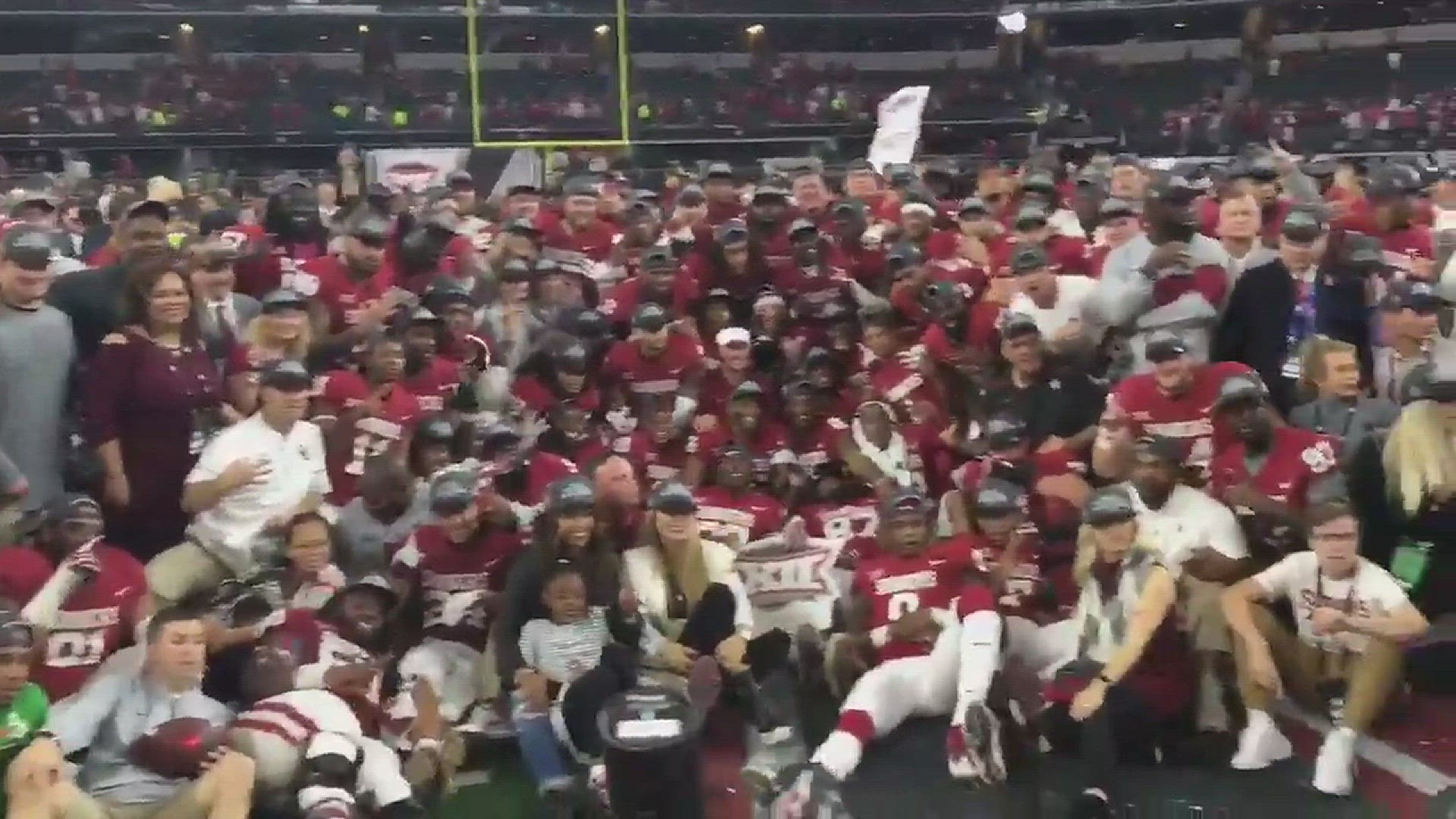 Sights and sounds at field-level after Oklahoma won the Big 12 Championship game at AT&T Stadium Saturday. WFAA.com