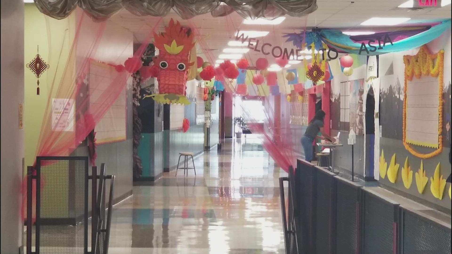 Staff at Jack Lowe, Sr. Elementary school are using elaborate, global-themed decorations to welcome students back for the 2021-2022 school year.