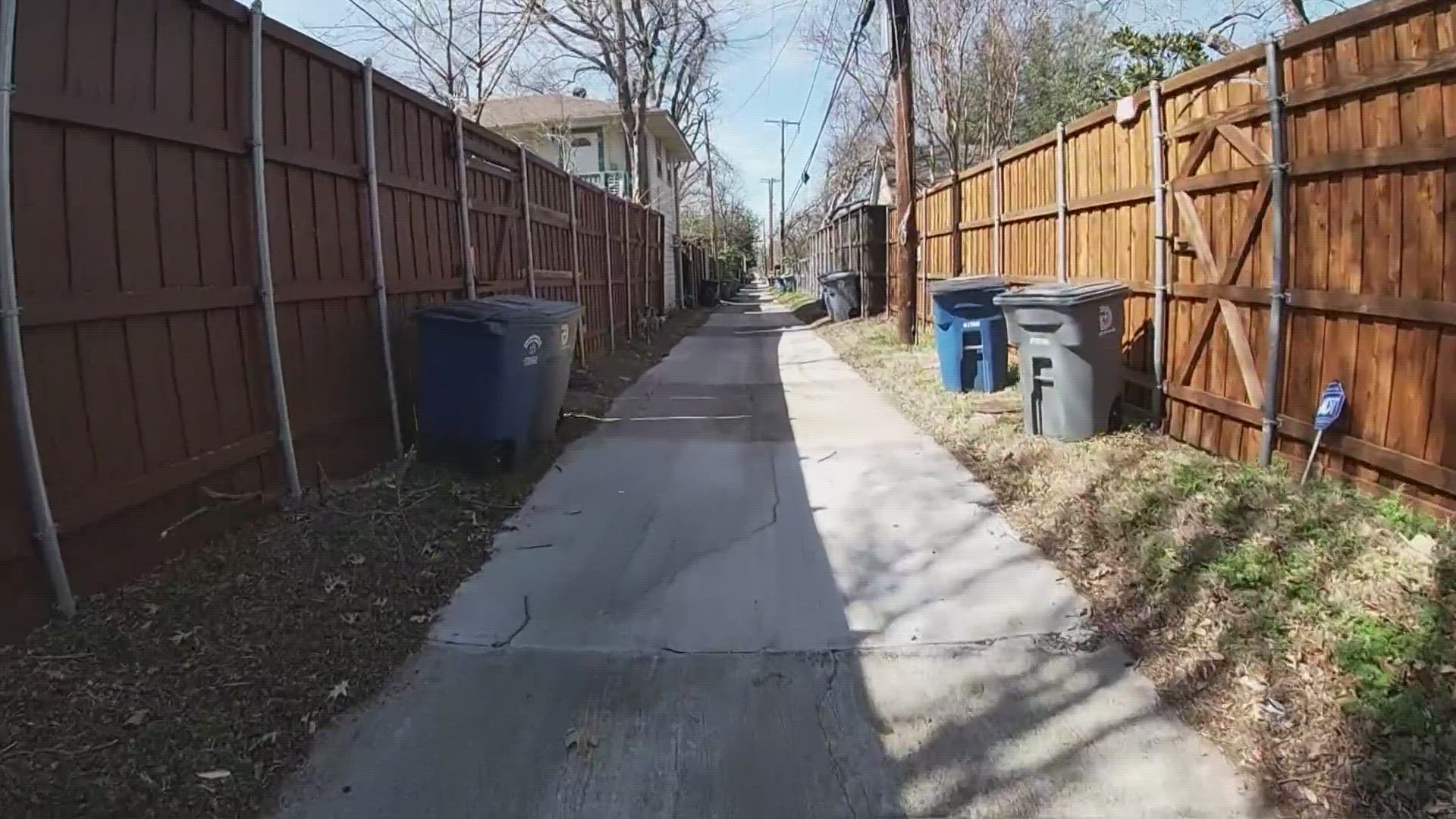 The city's sanitation department says it eventually wants to move nearly 100,000 more households to curbside trash pickup, instead of alleyway pickup.