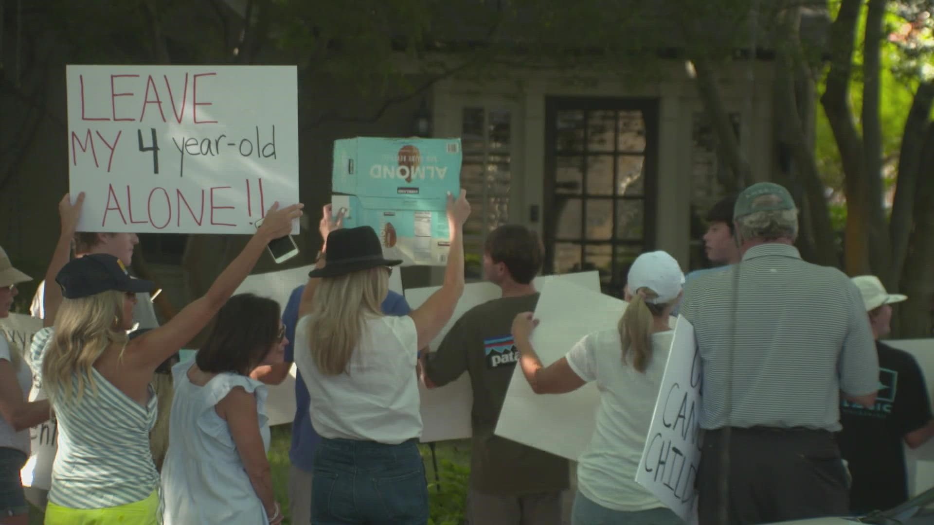More than 75 people showed up to Dallas County Judge Clay Jenkins' home on Thursday evening to protest his emergency order requiring masks.