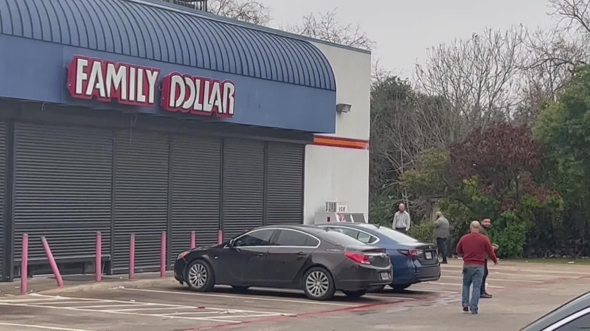 Police say a suspect has been arrested in connection to the death of a Family Dollar store employee in Dallas.