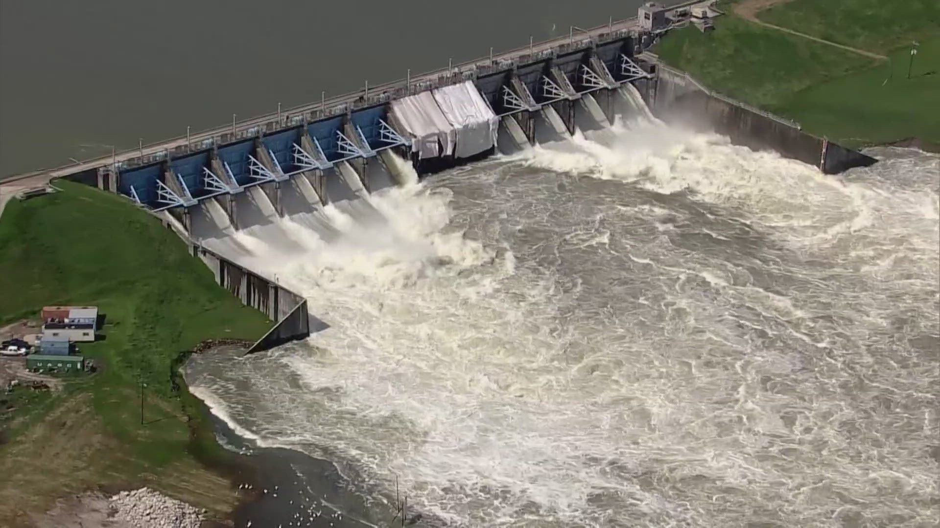 The spillway was damaged by recent flooding. There is no immediate danger according to the Trinity River Authority.