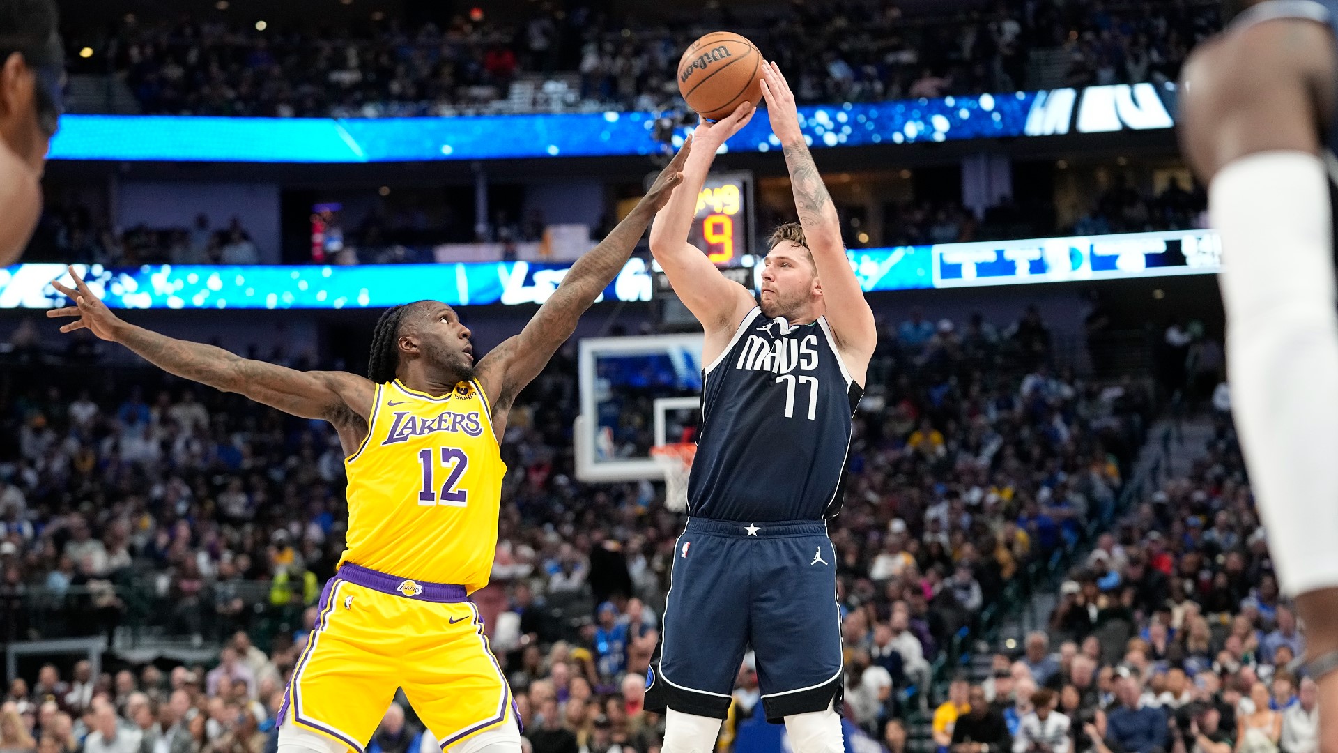 Luka Doncic had 33 points and 17 assists, Tim Hardaway Jr. scored a season-high 32 points and the Dallas Mavericks beat Los Angeles 127-125 on Tuesday night.
