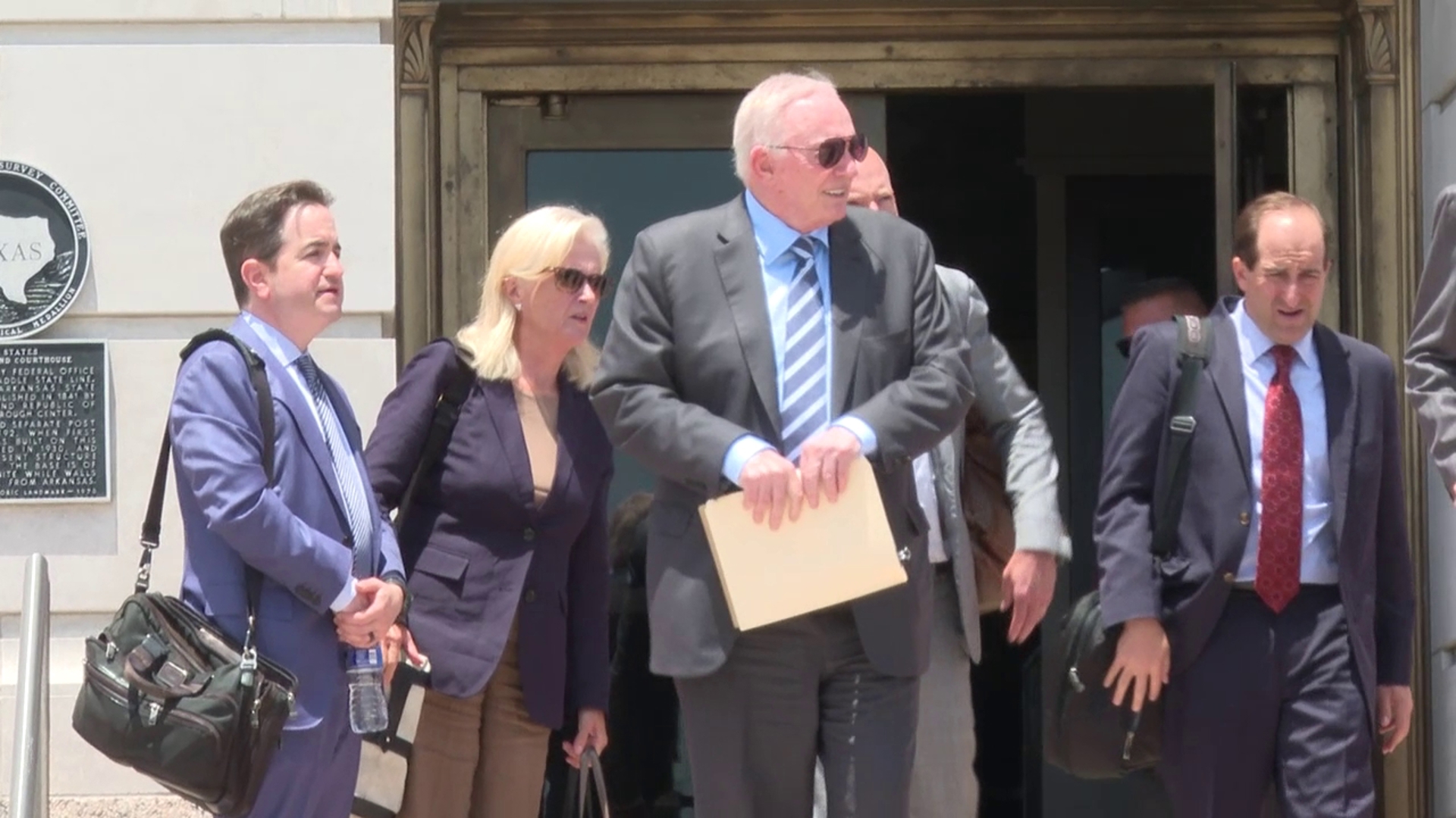 Dallas Cowboys Owner Jerry Jones walks out of court after jury selection Friday