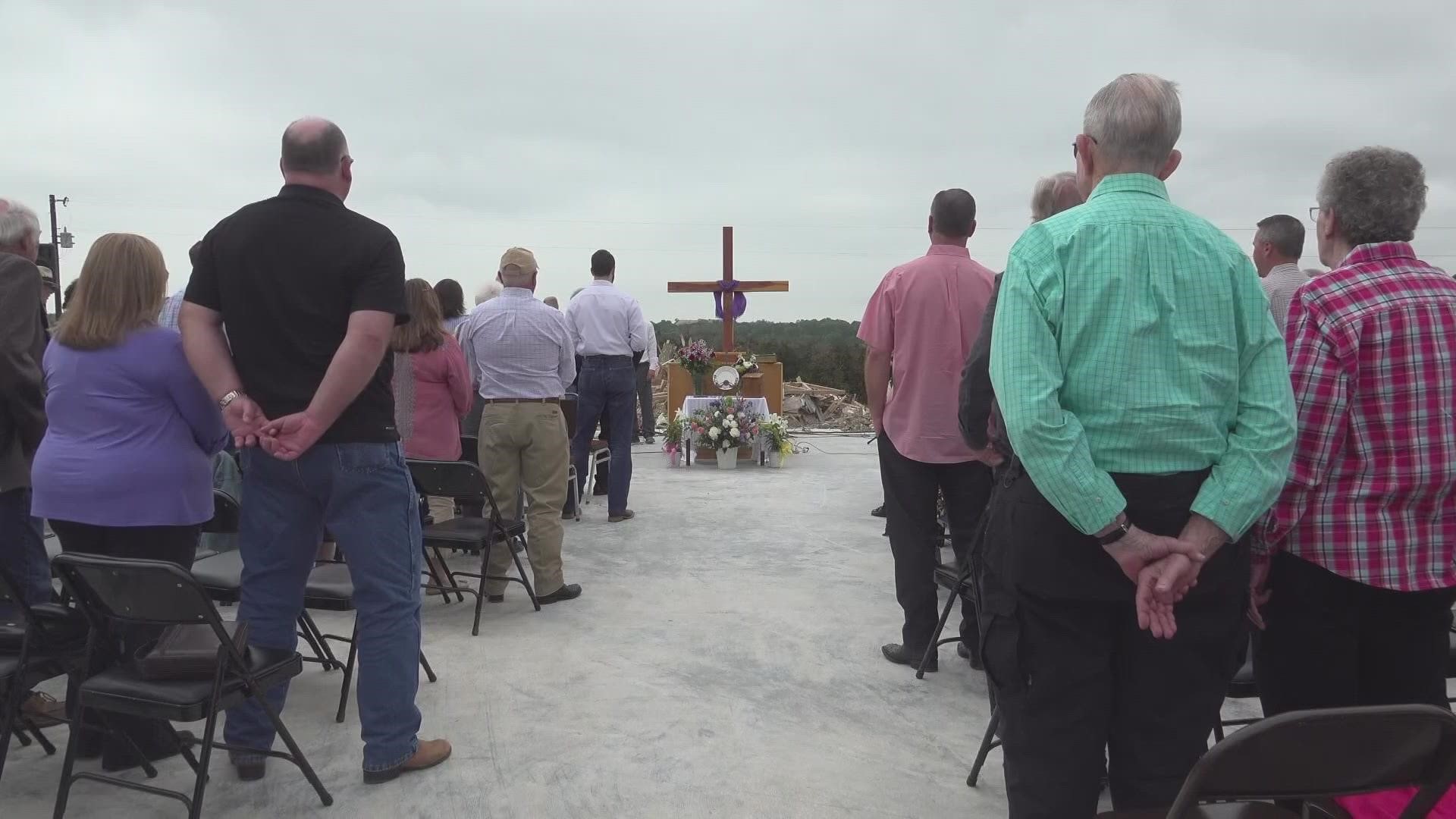 The congregation of a Salado, Texas church held Easter services where their church once stood and promised to rebuild.