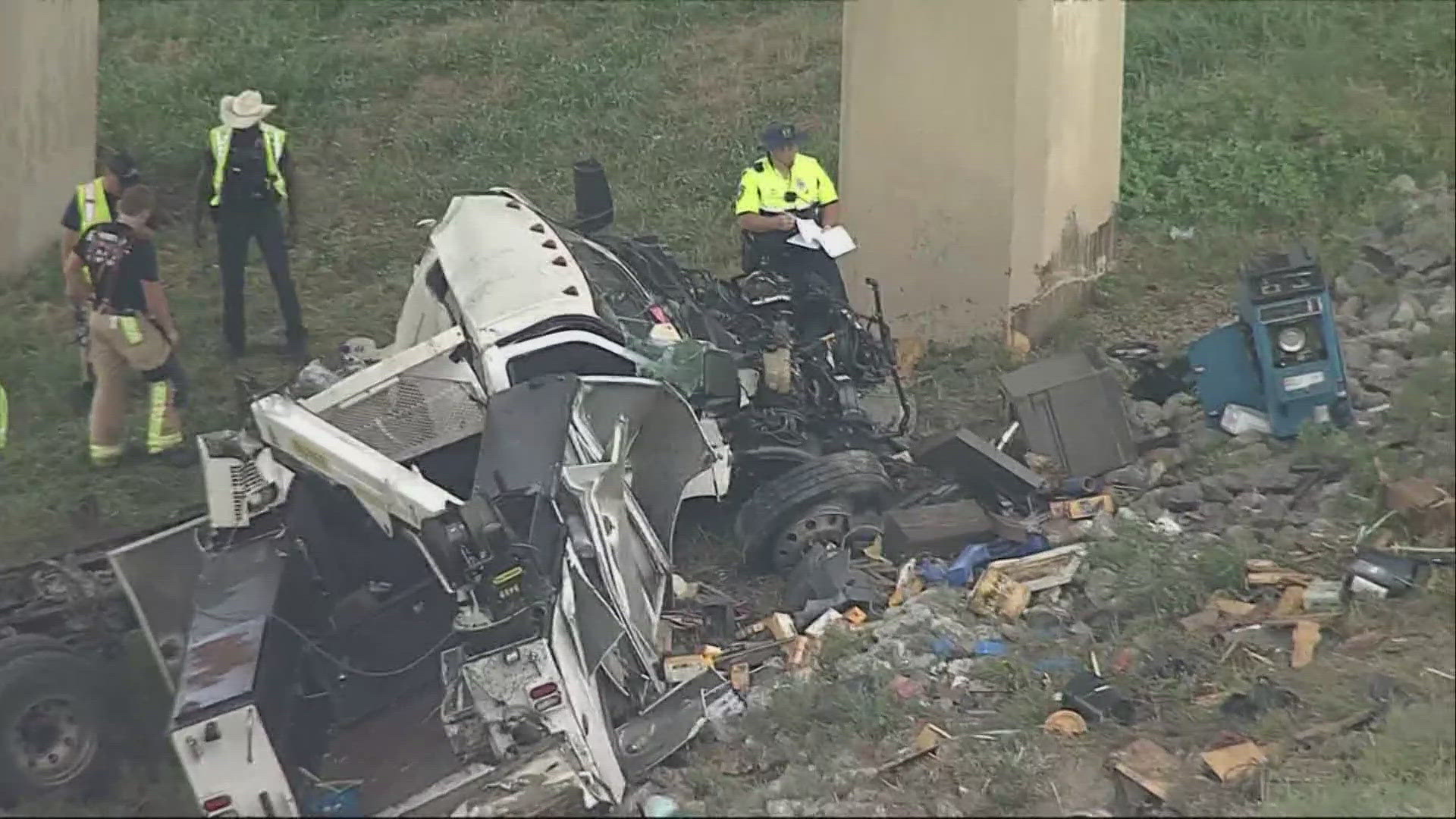 Footage of the scene shows at least one vehicle had crashed to the ground beneath the roadway.