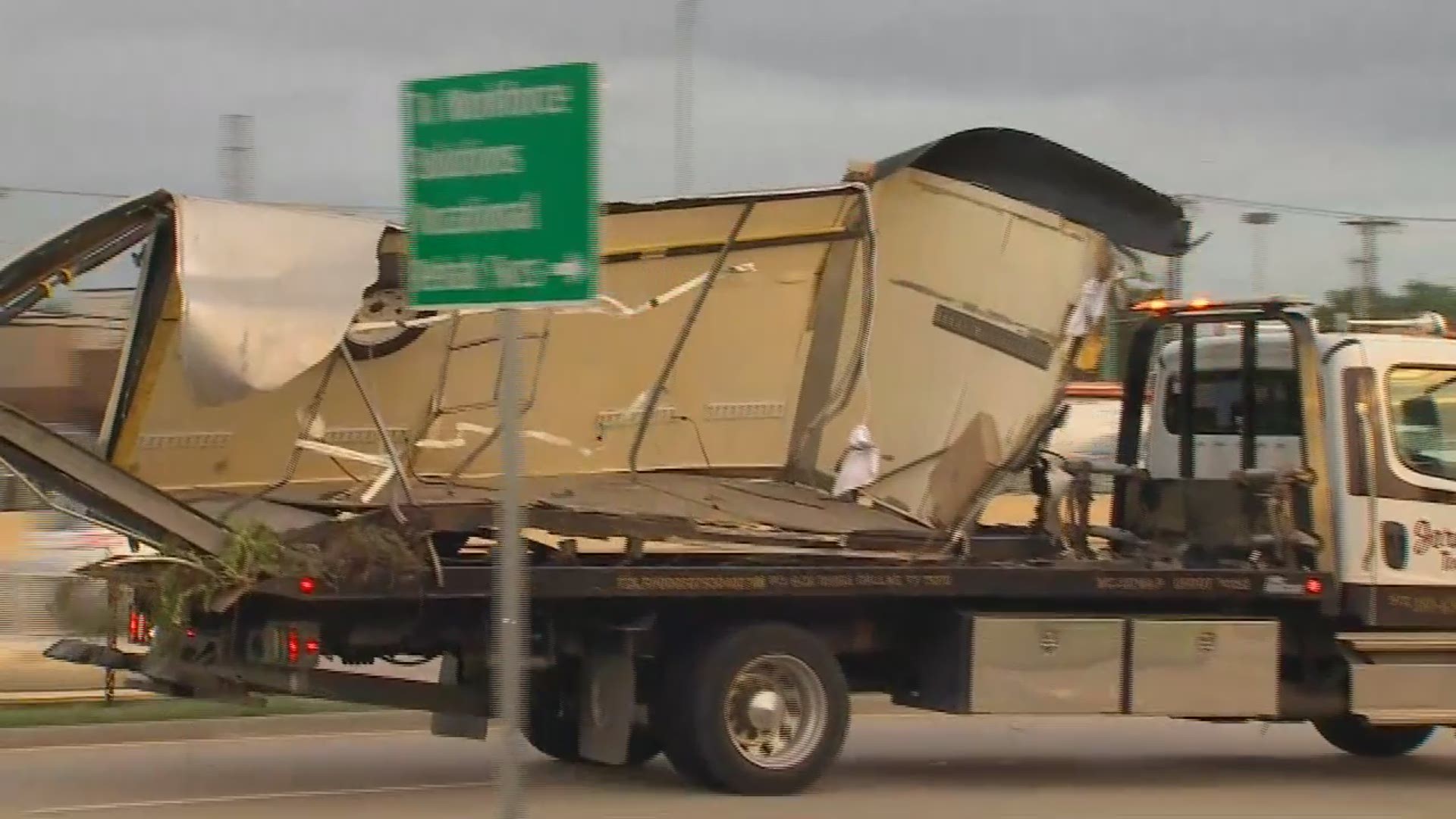 The driver was hauling a trailer and jumped a median, heading the wrong way down a U.S. 75 service road, police said.