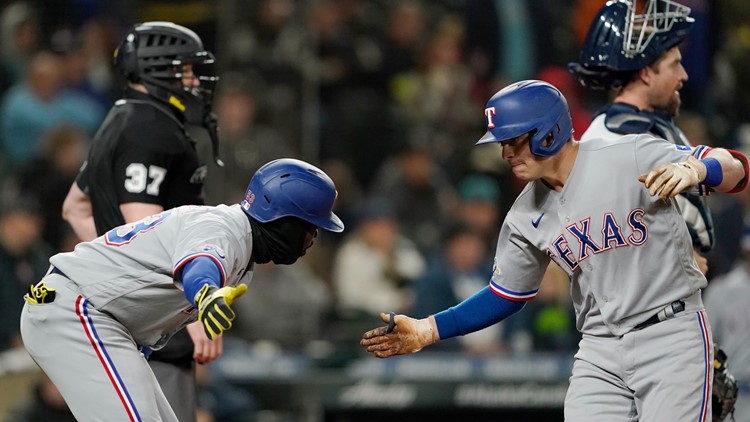Rangers snap 5-game skid, rally past Mariners for 8-6 win