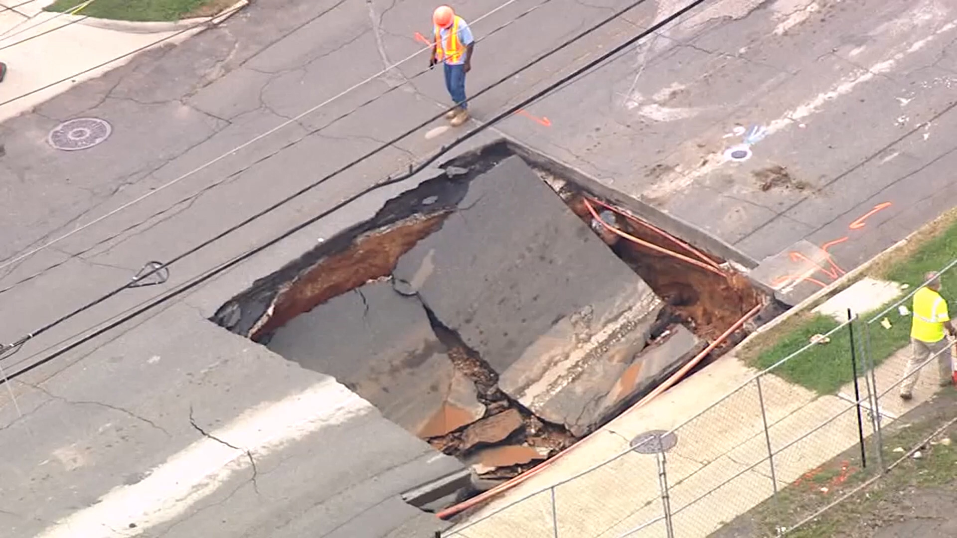 Crews are working to fill a sinkhole that opened near the home stadium of the NFL's Carolina Panthers in Charlotte, NC.