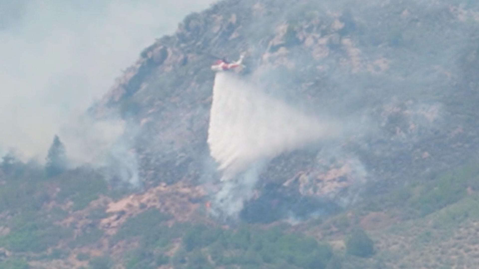 Planes and helicopters are working to put out wildfires in Colorado.