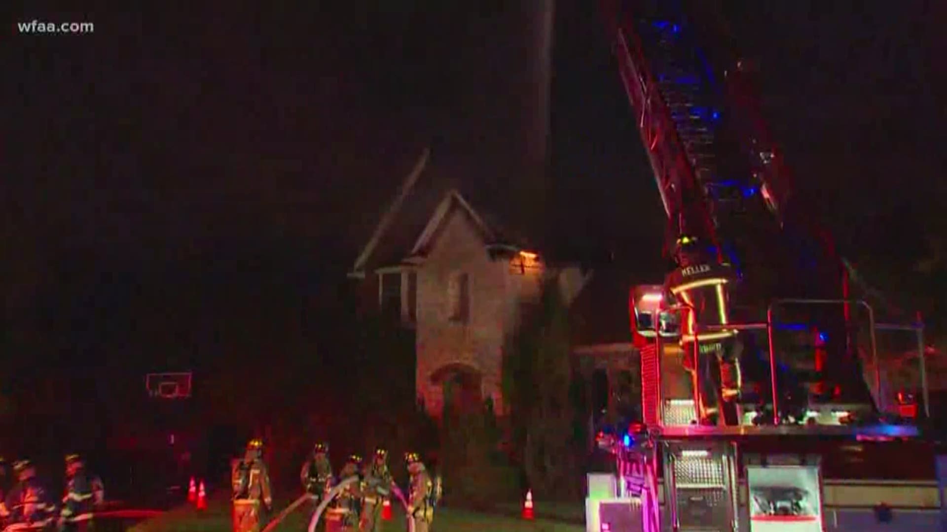 Firefighters battle house fire in Keller as storms roll through