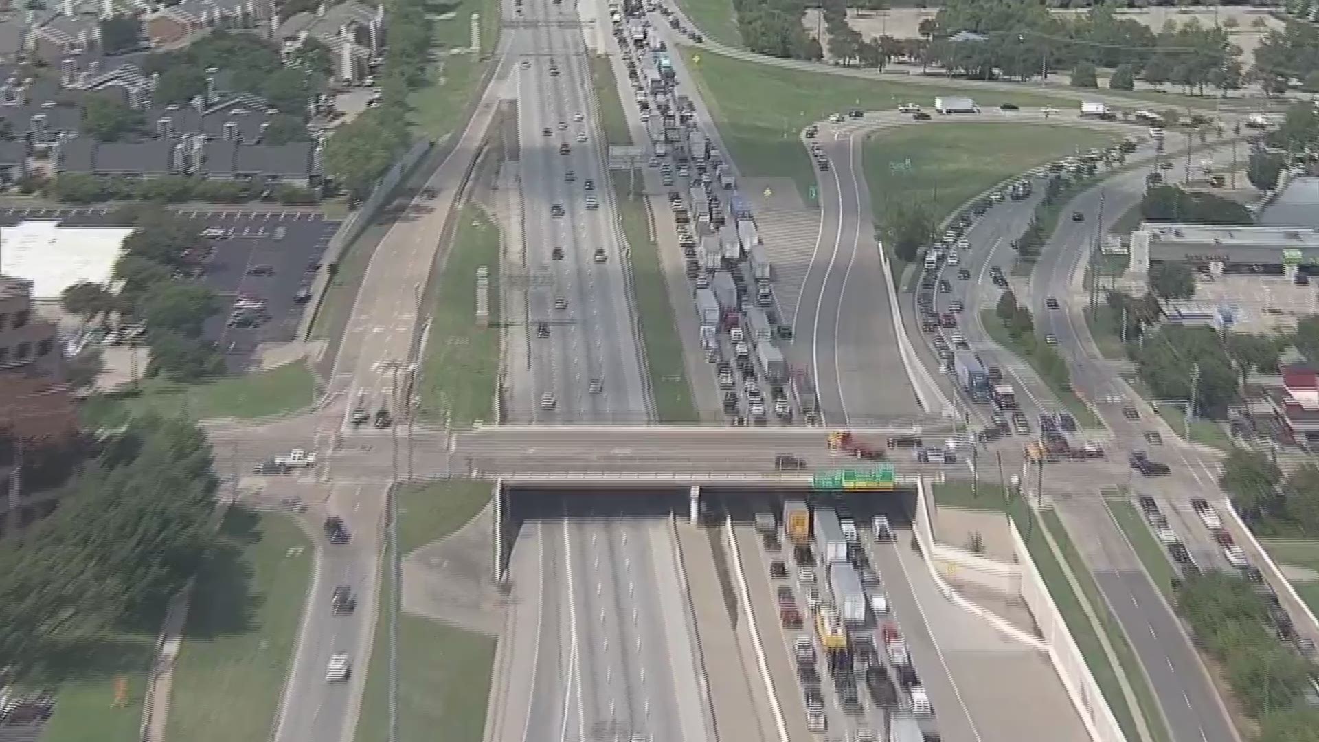 HD Chopper 8 captured aerial images of a traffic backup following an 18-wheeler hitting an overpass at Randol Mill Road.