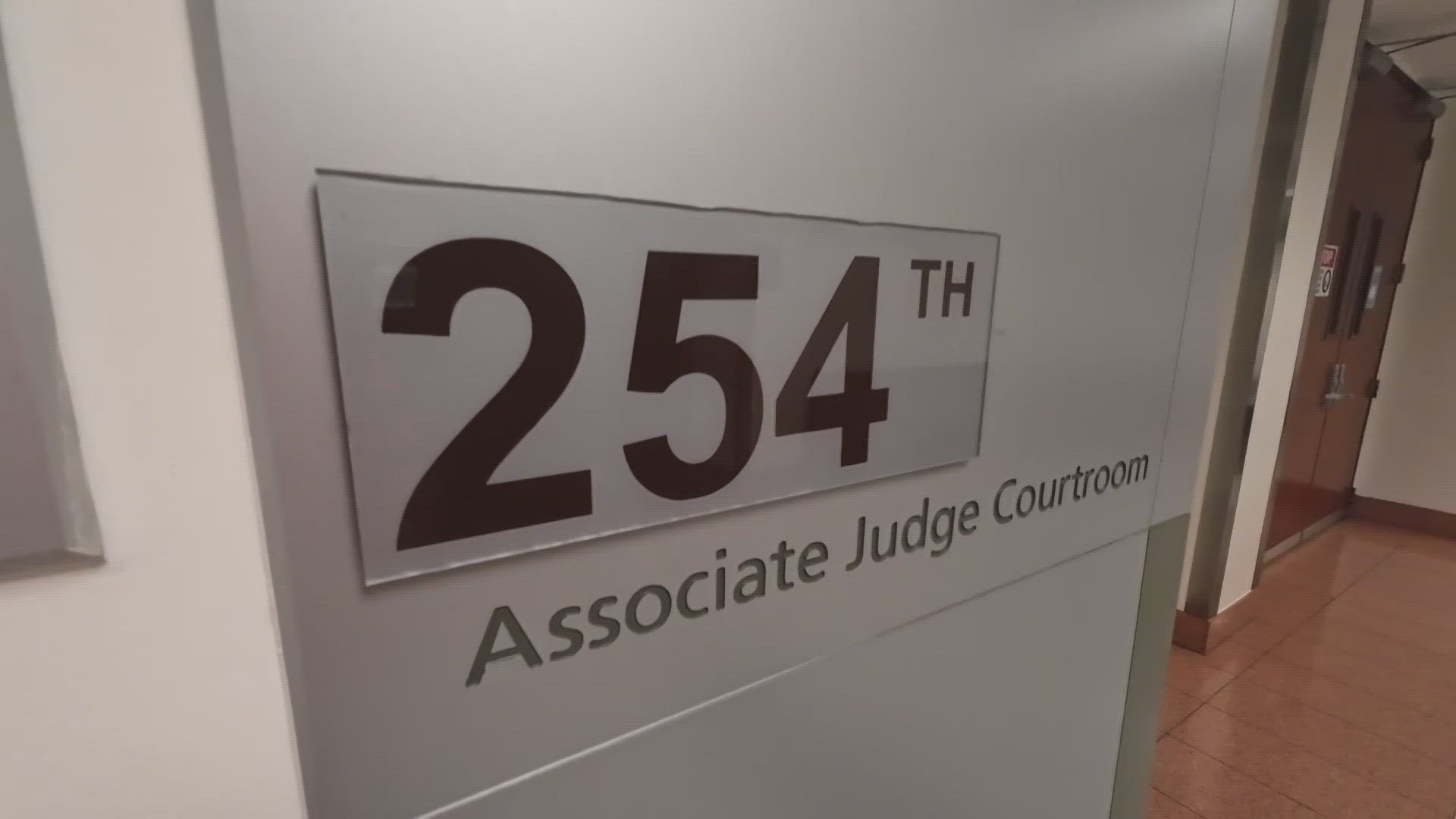 A Dallas County associate judge started work Tuesday even though there are questions about whether she's even eligible to be on the bench.