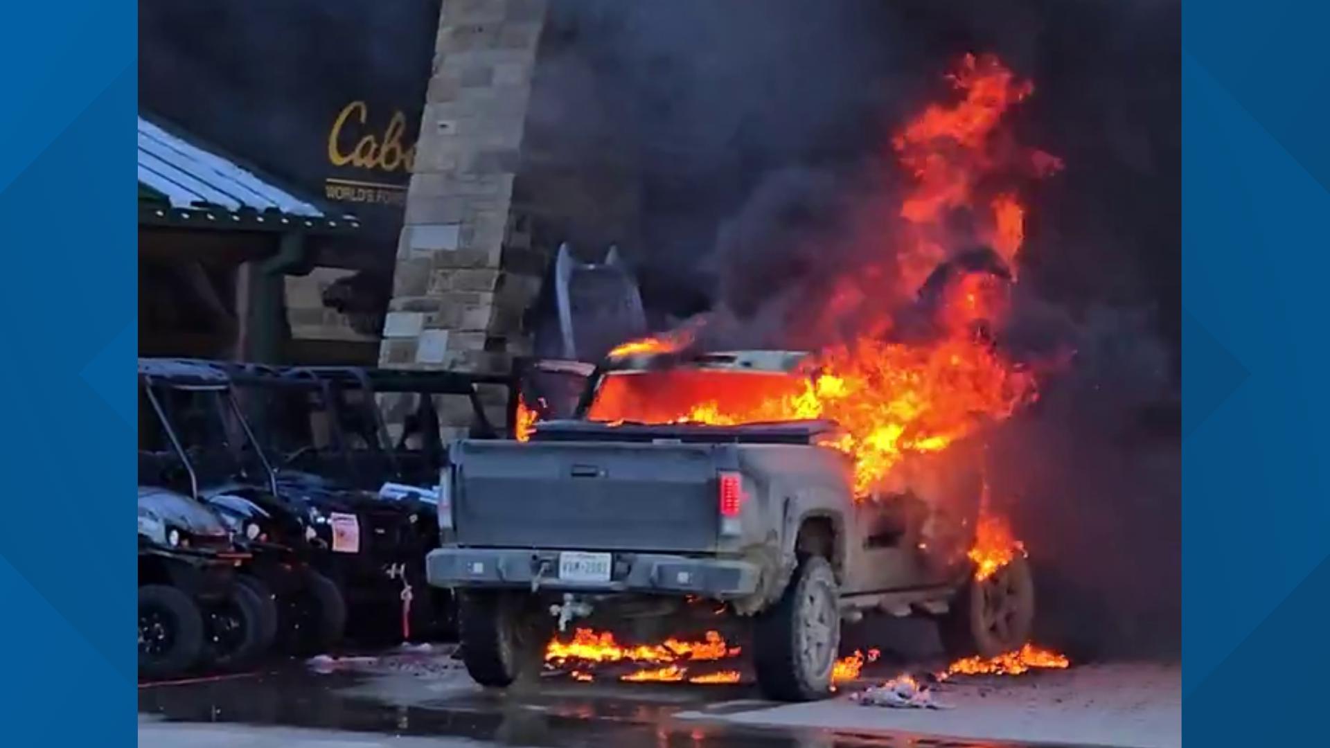 A witness captured video of huge flames coming from a truck  in front of a Cabela's in Fort Worth Saturday.