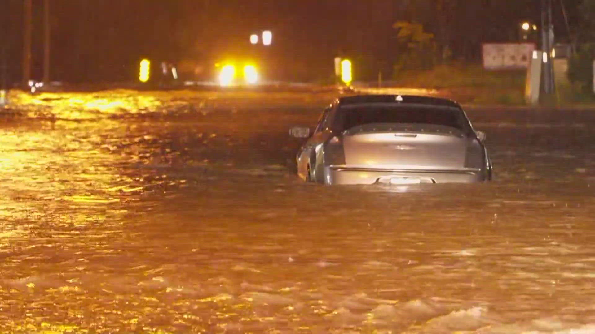 Flood waters submerged a vehicle in Everman overnight following heavy rain.