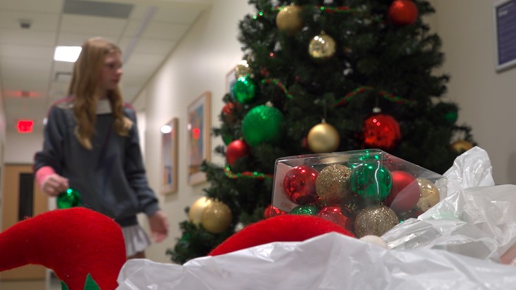 After life-saving transplant, Dallas girl returns to hospital to spread holiday cheer