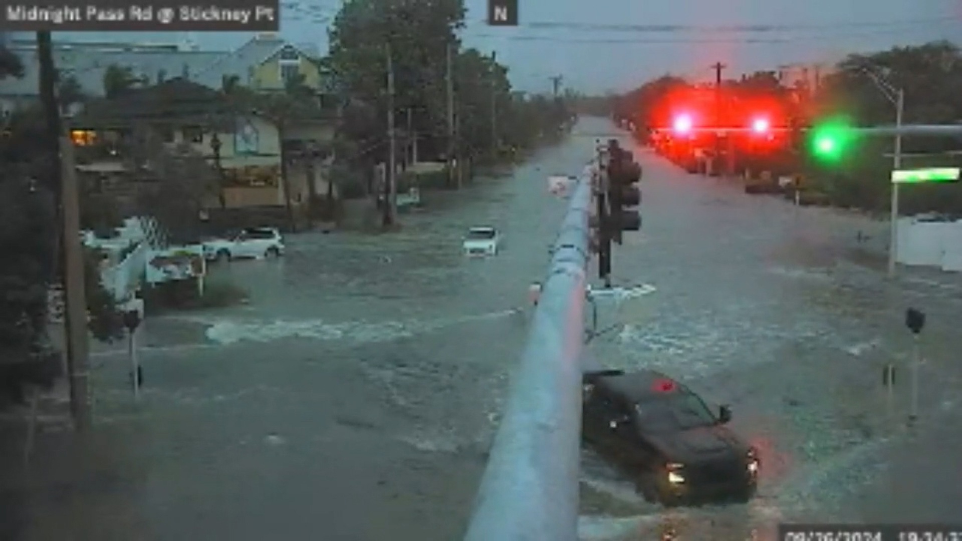 Hurricane Helene, a Category 4 hurricane, is causing major storm surge in Sarasota County, leading to flooding.