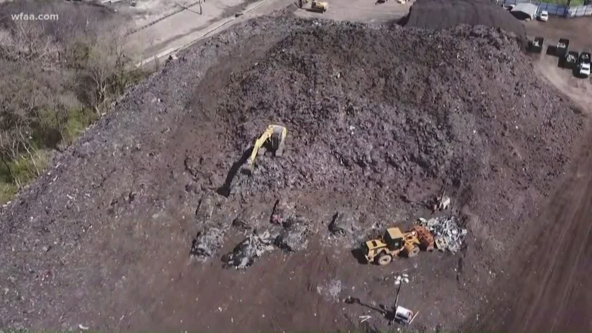 Temporary Restraining Order keeps Blue Star Recycling from adding to the pile of recycled shingles looming over homes in southern Dallas