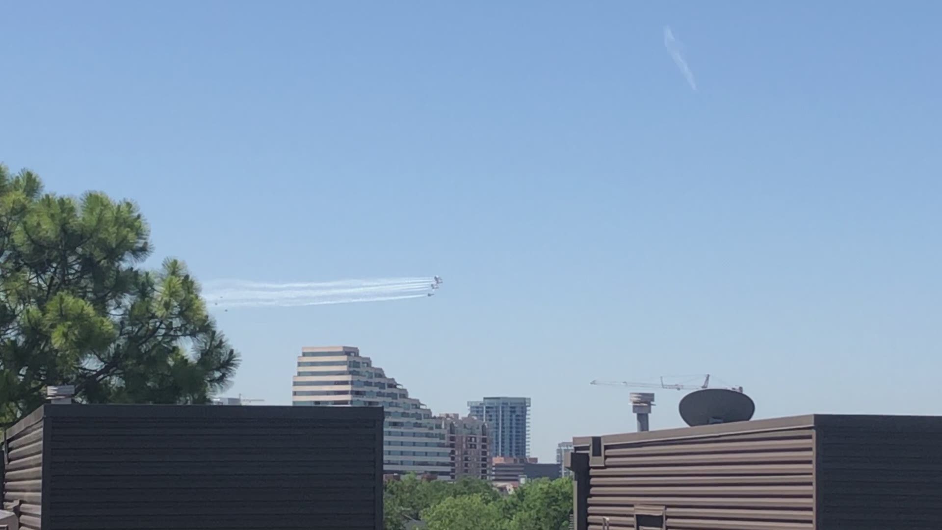 Julia Reece captured cell phone video of the U.S. Navy's Blue Angels flying over downtown Dallas on Wednesday.