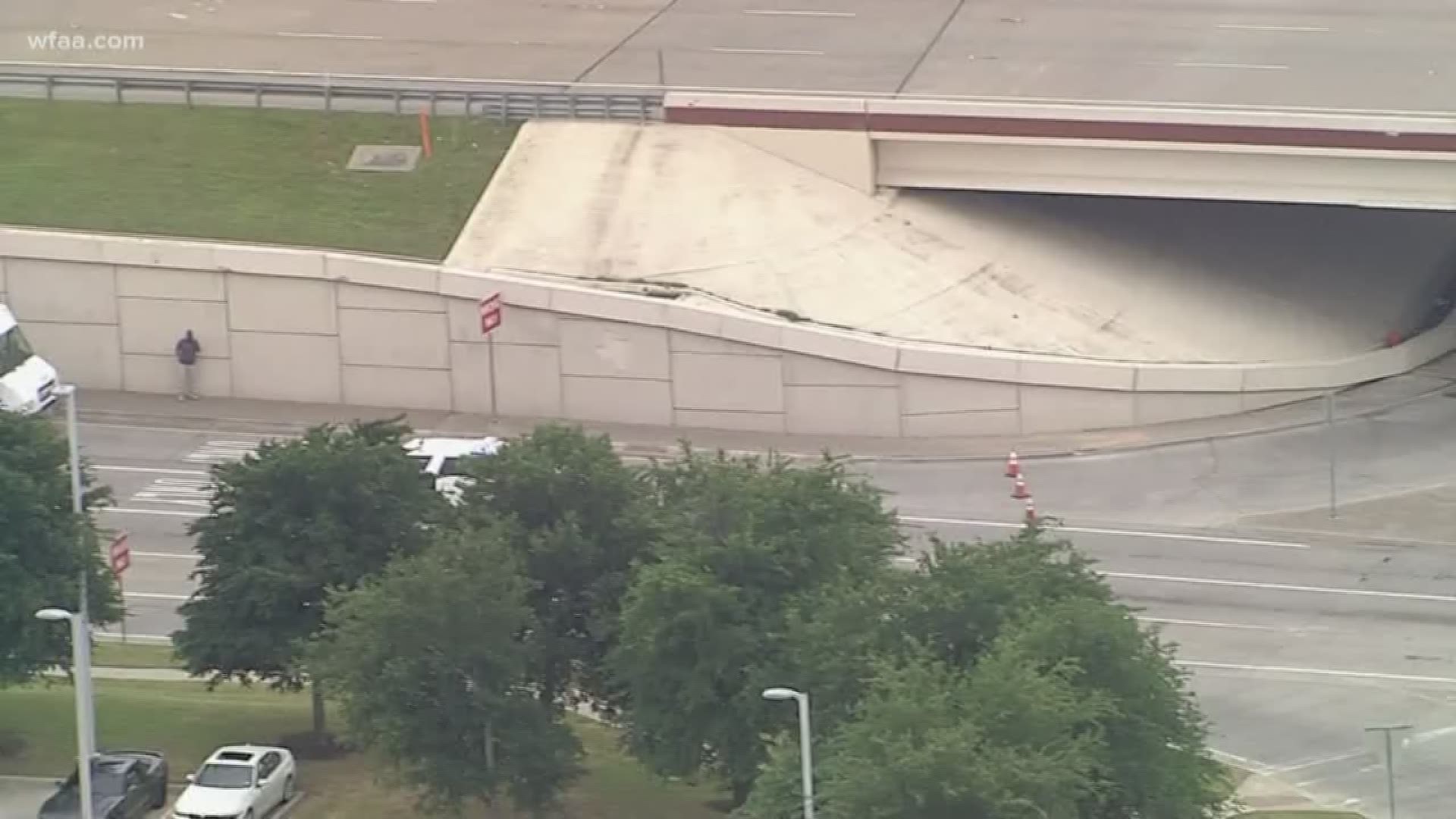 Plano police's bomb squad investigate suspicious item found underneath overpass of Bush Turnpike at Coit