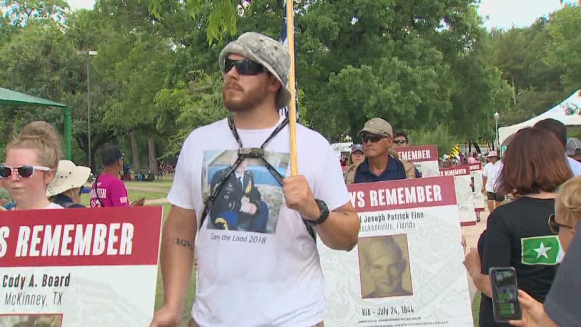 Supporters marched 20 hours overnight in Dallas during the Carry The Load Memorial Day march.