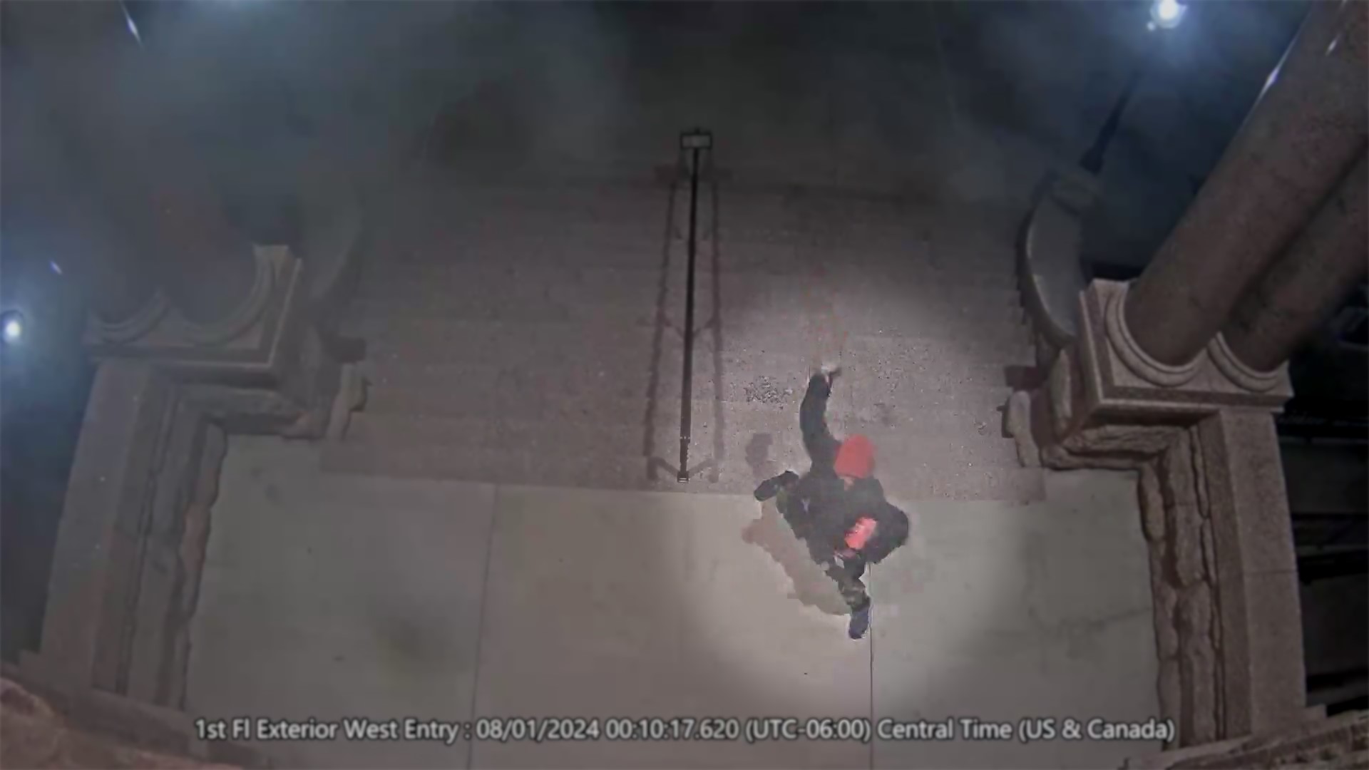 On Jan. 8, 2024, around 12:10 a.m., security camera footage shows a male throwing a rock at the courthouse door. The window on the door was broken.