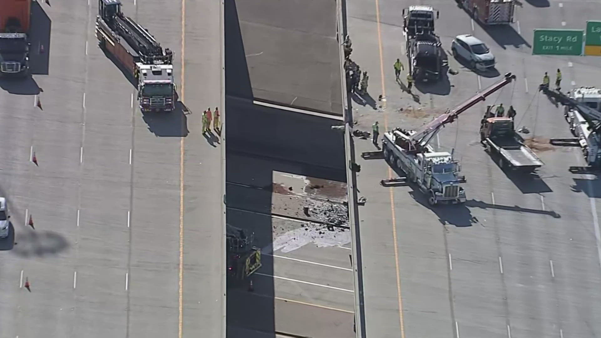 Truck hanging off overpass at U.S. 75 & Hwy 121 | wfaa.com