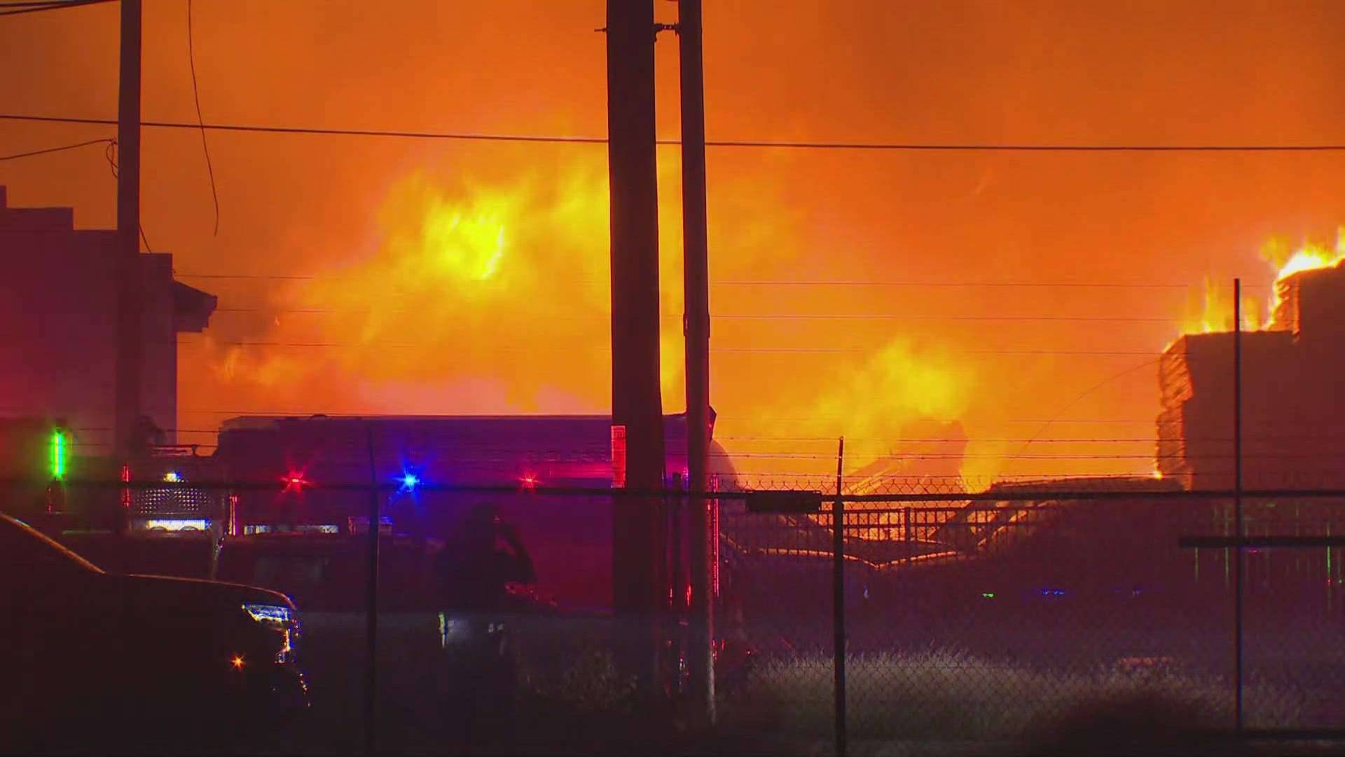 The three-alarm fire has been burning for hours.