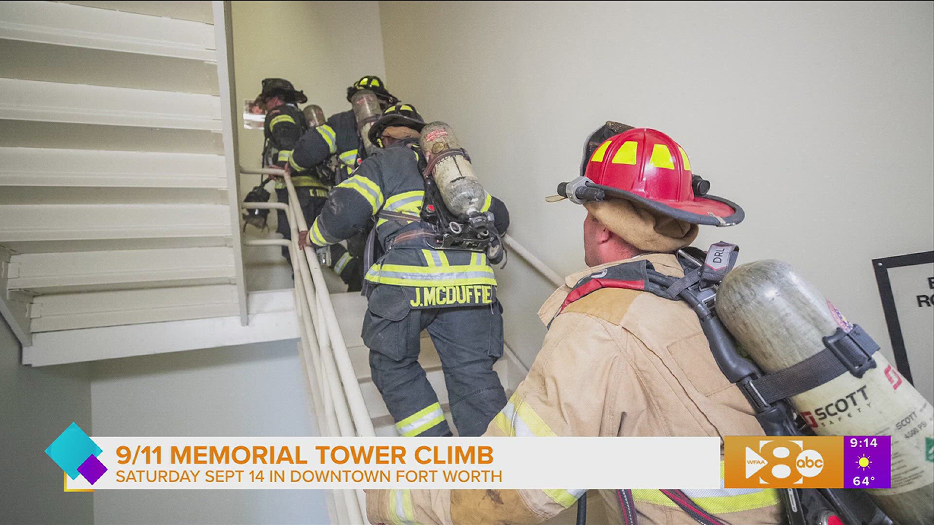 Fort Worth City Center CEO Johnny Campbell and Officer Jimmy Pollozani with the Fort Worth PD share information on the 3rd Annual 9/11 Memorial Tower Climb.