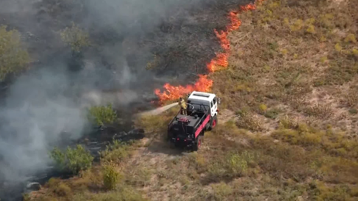 VIDEO First responders putting out grass fire in North Texas