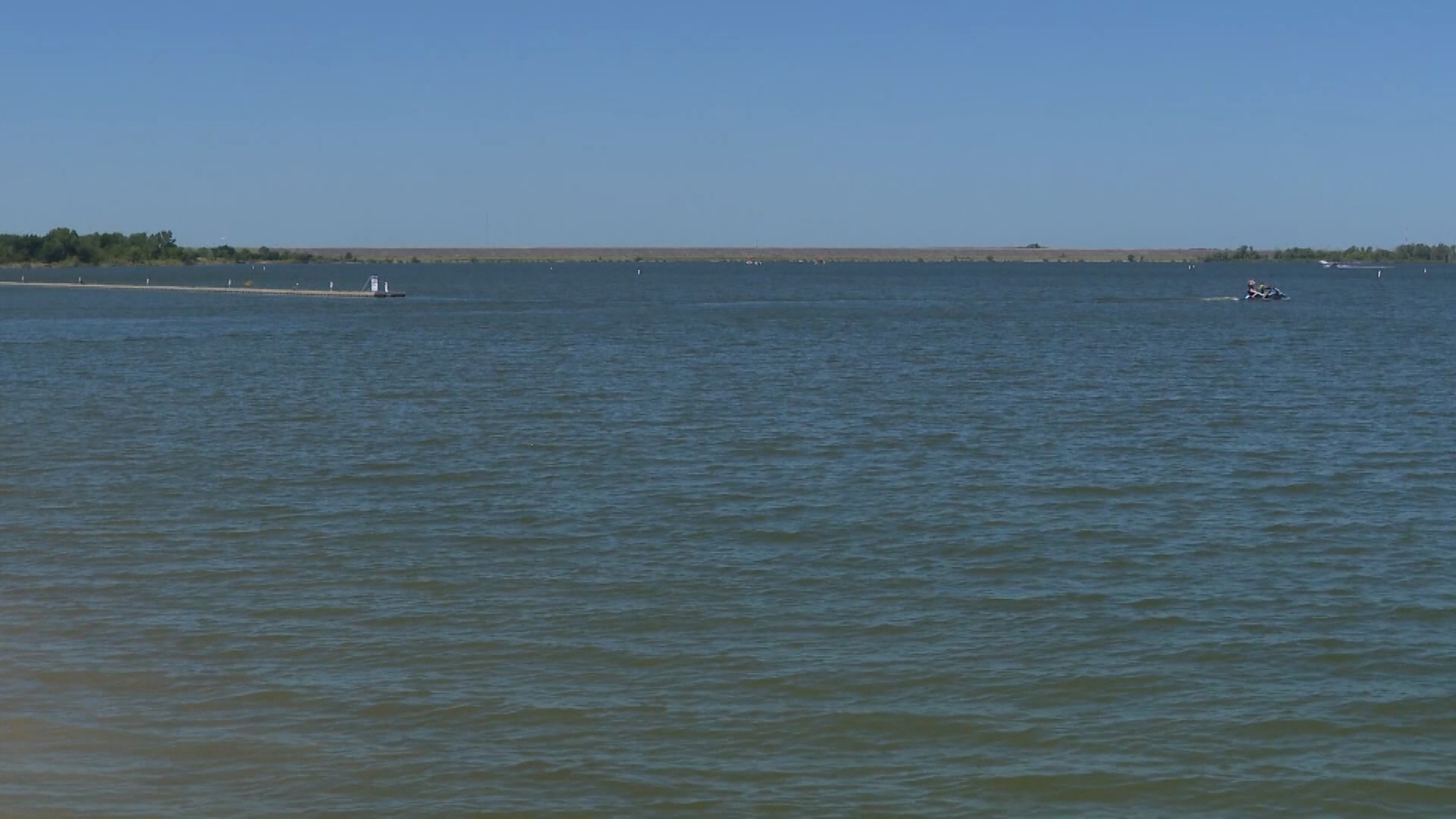 Authorities recovered a woman's body from Lake Lewisville after a reported drowning, officials said. 