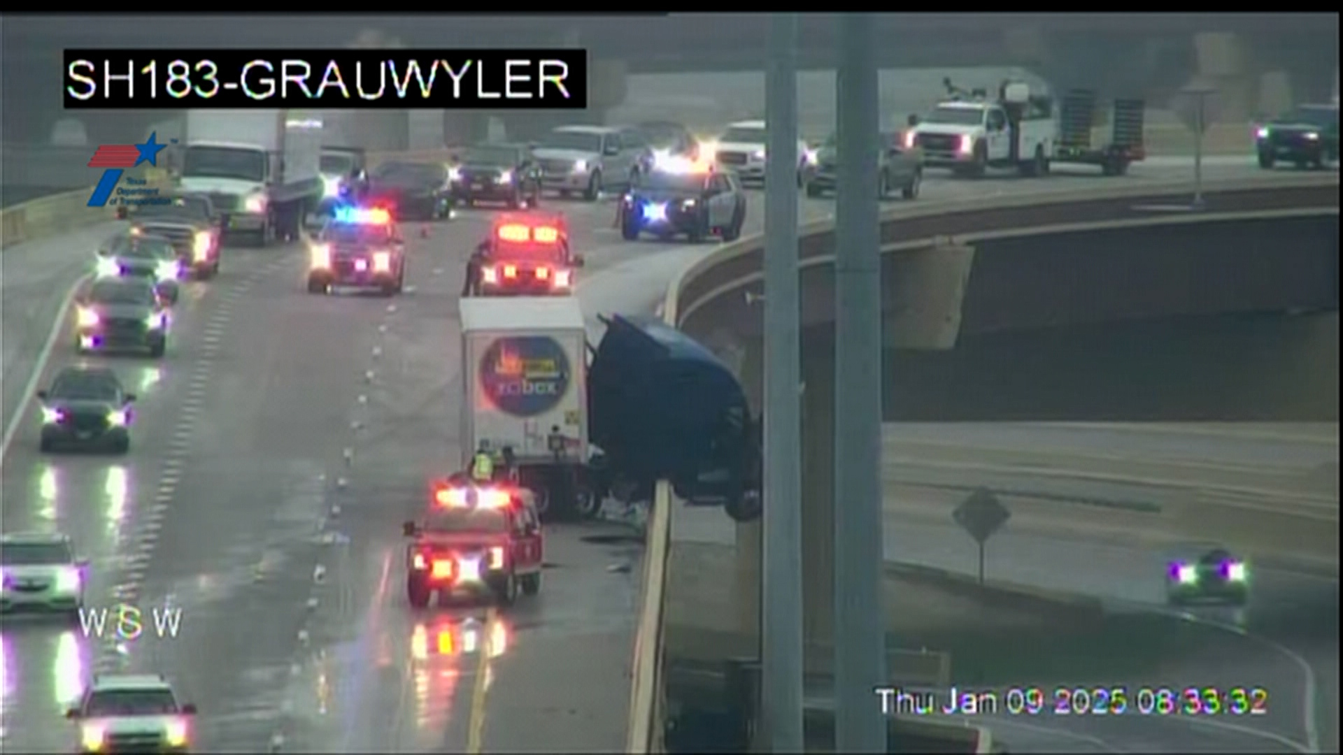 An 18-wheeler jackknifed near the Dallas-Irving border, slowing traffic Thursday morning.