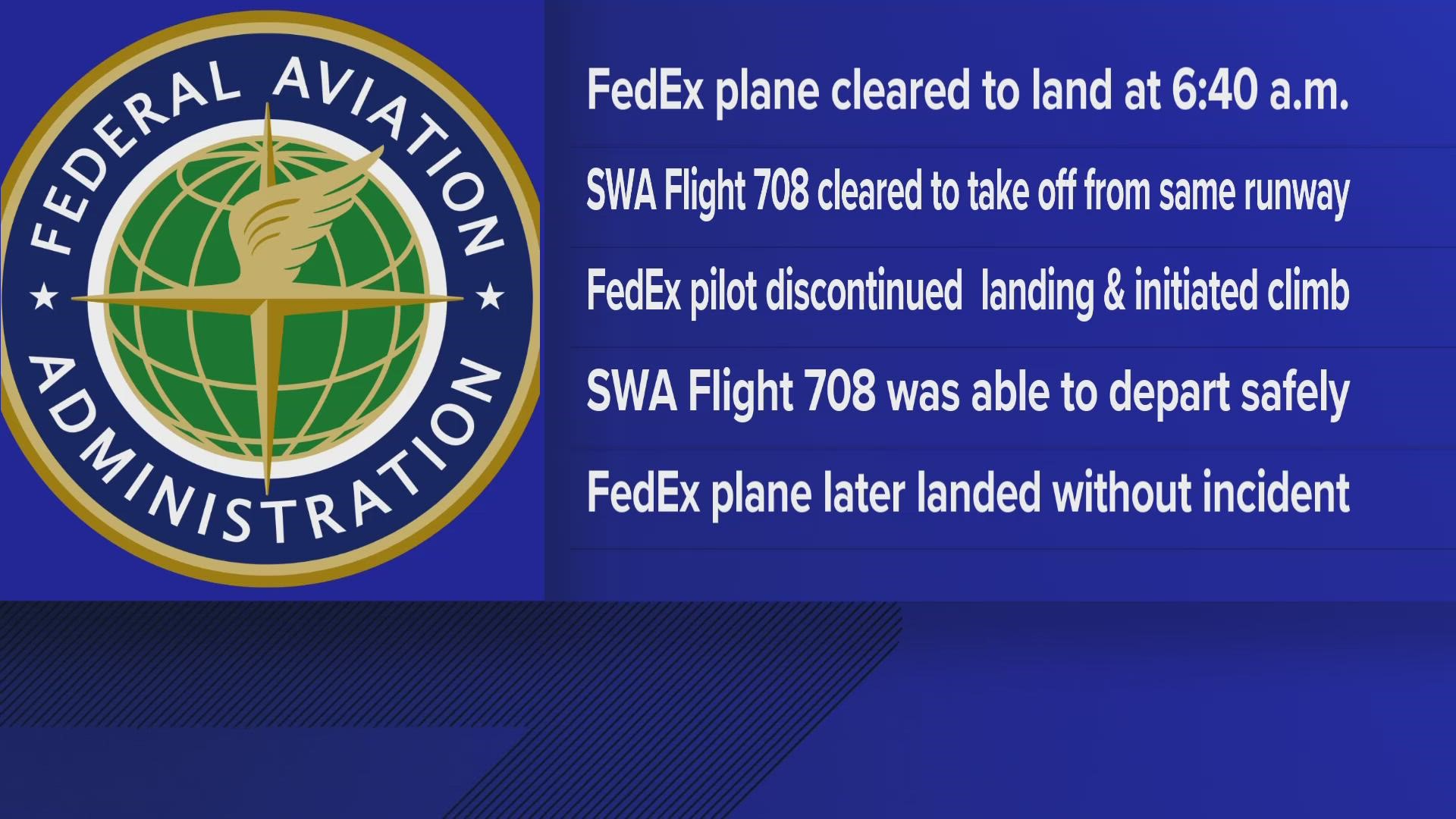 A FedEx cargo plane attempting to land at the Austin airport had to reverse course after a second plane was cleared to depart from the same runway.