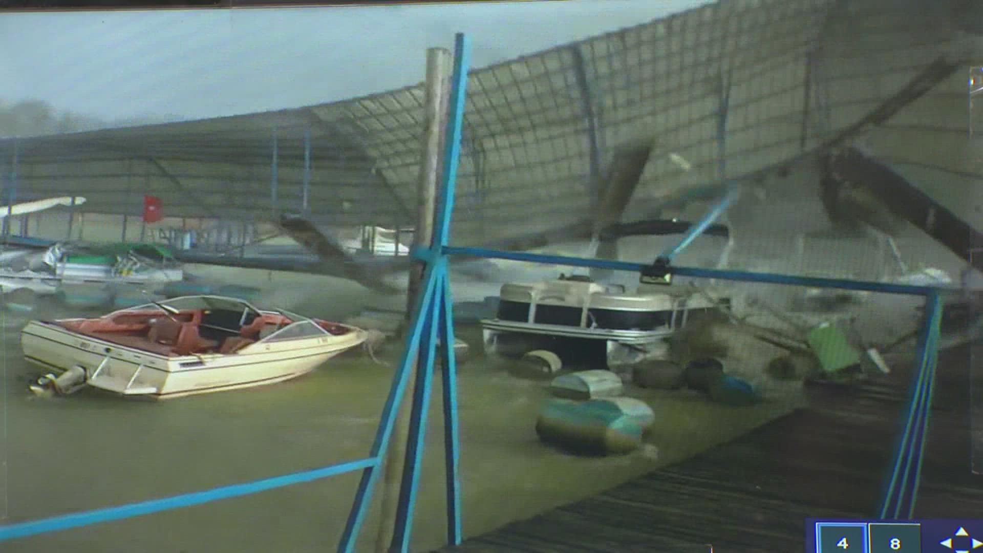 Surveillance video captured the moment a tornado tore through part of the deck and lifted a large metal awning into the air before the storm tore it apart.