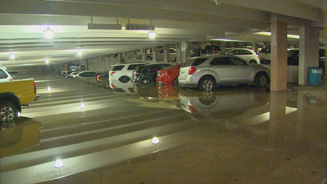 Flooding leaves vehicles underwater at Dallas Love Field parking garage ...