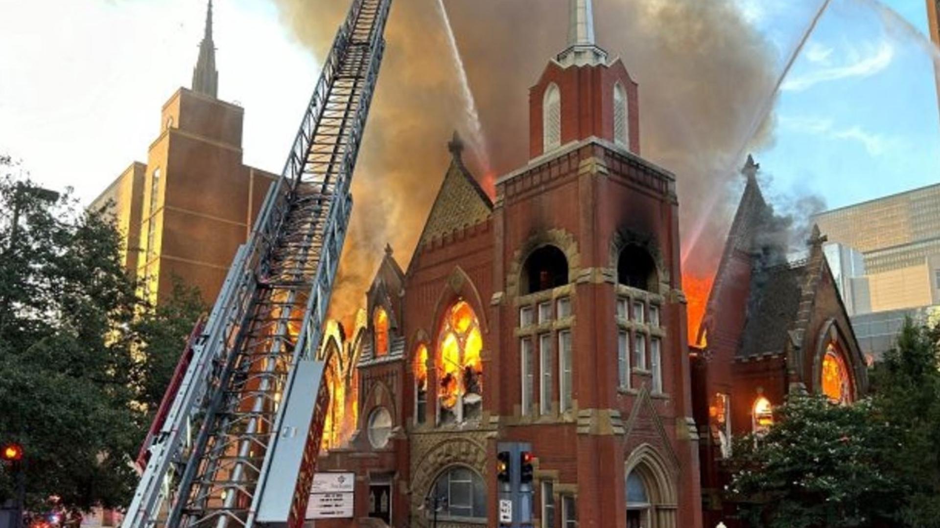 WFAA captured the reaction of those around the church as part of the building collapsed from the blaze.