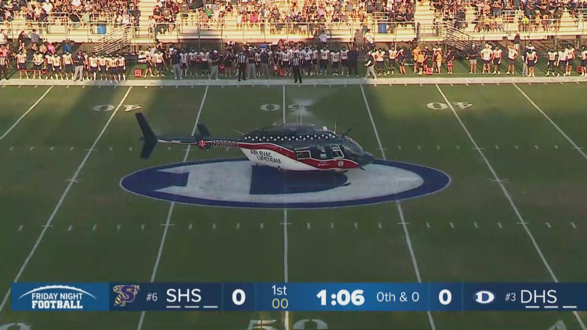 The showdown between the two ranked high school football teams had a unique opening as a helicopter descended upon the field to deliver the game ball.