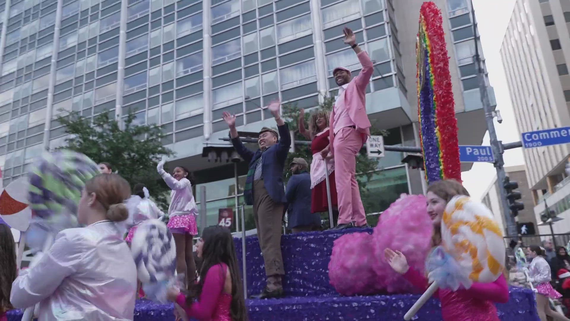 The parade included festive floats, marching bands and Santa Claus.